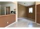 Neutral tones throughout the living spaces with tile floor, complemented by an open, airy layout at 2524 Woodgate Blvd # 201, Orlando, FL 32822