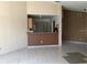 Open floor plan featuring tile flooring, and neutral paint colors, creating a seamless transition between spaces at 2524 Woodgate Blvd # 201, Orlando, FL 32822