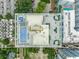 Aerial shot showcases the building's rooftop amenities, including a pool at 260 S Osceola Ave # 1207, Orlando, FL 32801