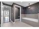 Beautiful bathroom boasts a soaking tub and stylish patterned wallpaper at 260 S Osceola Ave # 1207, Orlando, FL 32801