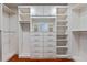 Custom closet with built-in shelving, drawers, and ample storage space for organization at 260 S Osceola Ave # 1207, Orlando, FL 32801