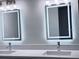 Bathroom featuring double sink vanity and LED mirrors at 2747 Rose Moss Ln, Orlando, FL 32807
