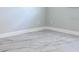 Bright bedroom with marble floors and white baseboards at 2747 Rose Moss Ln, Orlando, FL 32807