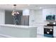 Beautiful kitchen boasting stainless steel appliances, an island, and ample lighting at 2747 Rose Moss Ln, Orlando, FL 32807