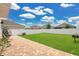 Spacious backyard with patio and well-maintained lawn, great for outdoor activities at 2834 Common Crane Ct, St Cloud, FL 34773