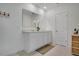 Bright bathroom featuring a double vanity with a large mirror and plenty of counter space at 2834 Common Crane Ct, St Cloud, FL 34773