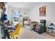 Youthful bedroom with modern décor, a themed bed, and comfortable seating area at 2834 Common Crane Ct, St Cloud, FL 34773