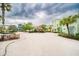 Community greenspace with sand and a shaded play area at 3062 Pirate Way, Kissimmee, FL 34747