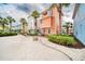 Colorful community with vibrant exteriors and tropical landscaping surrounding the homes at 3062 Pirate Way, Kissimmee, FL 34747