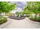 A well-equipped playground is surrounded by mature trees, creating a fun and inviting play area at 3062 Pirate Way, Kissimmee, FL 34747