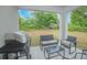 Covered patio with furniture and outdoor grill at 3479 Courtland Blvd, Deltona, FL 32738