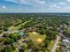 Aerial view of the neighborhood and community, showcasing the proximity to green spaces and the golf course at 3987 Lancashire Ln # 3987, Longwood, FL 32779
