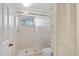 Bright bathroom with a tiled shower and closet storage at 3987 Lancashire Ln # 3987, Longwood, FL 32779