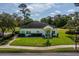 A well-maintained building featuring lush landscaping, showcases the community's commitment to curb appeal at 3987 Lancashire Ln # 3987, Longwood, FL 32779