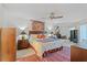 Comfortable main bedroom with ceiling fan, natural light and simple decor at 3987 Lancashire Ln # 3987, Longwood, FL 32779