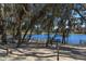 Enjoy waterfront serenity with a lakeside bench area to relax in a tranquil environment at 3987 Lancashire Ln # 3987, Longwood, FL 32779