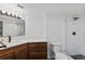 Updated bathroom featuring dark wood vanity and a glass enclosed shower at 400 E Colonial Dr # 402, Orlando, FL 32803