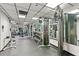 Gym featuring modern weight training equipment, mirrors, and rubber floors at 400 E Colonial Dr # 402, Orlando, FL 32803