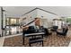 Lobby featuring a piano, patterned rugs, marble floors, and modern furniture at 400 E Colonial Dr # 402, Orlando, FL 32803