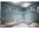 Relaxing tiled steam room with built-in seating for a spa-like experience at 400 E Colonial Dr # 402, Orlando, FL 32803