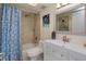 Cozy bathroom with a tiled shower and a white vanity with modern fixtures at 470 Oak Haven Dr # 470, Altamonte Springs, FL 32701