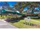 Covered entry to the Harbour Club community center with lush landscaping at 470 Oak Haven Dr # 470, Altamonte Springs, FL 32701