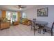 Inviting living area with wicker seating, tile floors, and access to the outdoors at 470 Oak Haven Dr # 470, Altamonte Springs, FL 32701