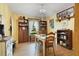 Inviting dining room with yellow walls, hardwood floors and a chandelier at 4927 Fiske Cir, Orlando, FL 32826