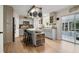 Bright kitchen with stainless appliances, island, and plenty of cabinet space at 4927 Fiske Cir, Orlando, FL 32826