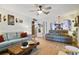 Comfortable living room with hardwood floors, neutral walls, and an open floor plan at 4927 Fiske Cir, Orlando, FL 32826