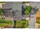 An aerial shot shows a well-maintained home with lush green grass, mature trees, and a classic dark gray roof at 508 Boxelder Ave, Altamonte Springs, FL 32714