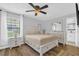 Primary bedroom with new furniture, a ceiling fan, luxury vinyl flooring, a closet, and lots of natural light at 508 Boxelder Ave, Altamonte Springs, FL 32714