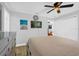 Cozy bedroom with hardwood floors, closet, and modern ceiling fan at 508 Boxelder Ave, Altamonte Springs, FL 32714