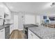 Contemporary kitchen featuring granite countertops and stainless steel appliances at 508 Boxelder Ave, Altamonte Springs, FL 32714