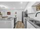 Modern kitchen with stainless steel appliances and granite countertops at 508 Boxelder Ave, Altamonte Springs, FL 32714