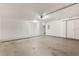 A clean and spacious garage with smooth concrete floor at 6107 Metrowest Blvd # 104, Orlando, FL 32835
