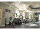 Bright gym with multiple cardio machines and wall decor at 6107 Metrowest Blvd # 104, Orlando, FL 32835