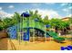 Colorful community playground with climbing structures and slides at 6107 Metrowest Blvd # 104, Orlando, FL 32835