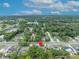 Property located in a tranquil neighborhood with nearby lake, visible from this aerial perspective at 806 Bear Lake Rd, Apopka, FL 32703