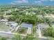 An aerial view displays a lovely single-story home with a new roof and charming curb appeal at 806 Bear Lake Rd, Apopka, FL 32703