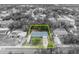 Aerial view of a property outlined in yellow, showcasing the house and its location at 806 Bear Lake Rd, Apopka, FL 32703