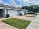 Multiple garages in a row with brick driveways at 8417 Leeland Archer Blvd, Orlando, FL 32836