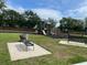 Community playground area with swings and play structure at 8417 Leeland Archer Blvd, Orlando, FL 32836