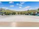 Outdoor common area featuring shade structures, benches and manicured landscaping at 867 Bama Breeze Dr, Daytona Beach, FL 32124