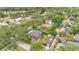 Wide aerial view showing the home's location with pool and outdoor entertainment area at 900 S Palmetto Ave, Sanford, FL 32771