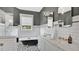 Charming bathroom with white subway tile, a clawfoot tub, patterned tile floor, and double sink vanity at 900 S Palmetto Ave, Sanford, FL 32771