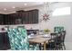 Open-concept living space includes kitchen and dining areas, great for entertaining guests and Gathering at 9038 Sunshine Ridge Loop, Kissimmee, FL 34747