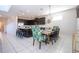 Open-concept living space includes kitchen and dining areas, great for entertaining guests and Gathering at 9038 Sunshine Ridge Loop, Kissimmee, FL 34747