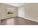 This bedroom features a window for natural light and a spacious closet at 922 Hatteras Ave, Minneola, FL 34715