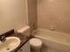Clean and functional bathroom with bathtub, toilet, and vanity at 9926 Turf Way # 8, Orlando, FL 32837